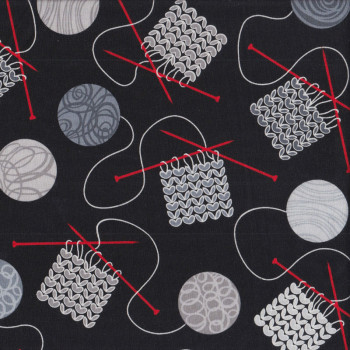 Knitting Needles Balls of Yarn on Black Quilting Fabric