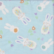 Easter Bouncing Bunny Rabbits on Pastel Blue Spring Parade Quilting Fabric